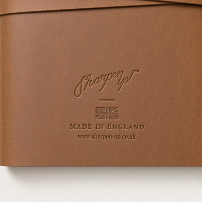 Debossed Sharpen Up stamp on back cover